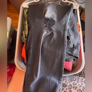 Faded black distressed jeans